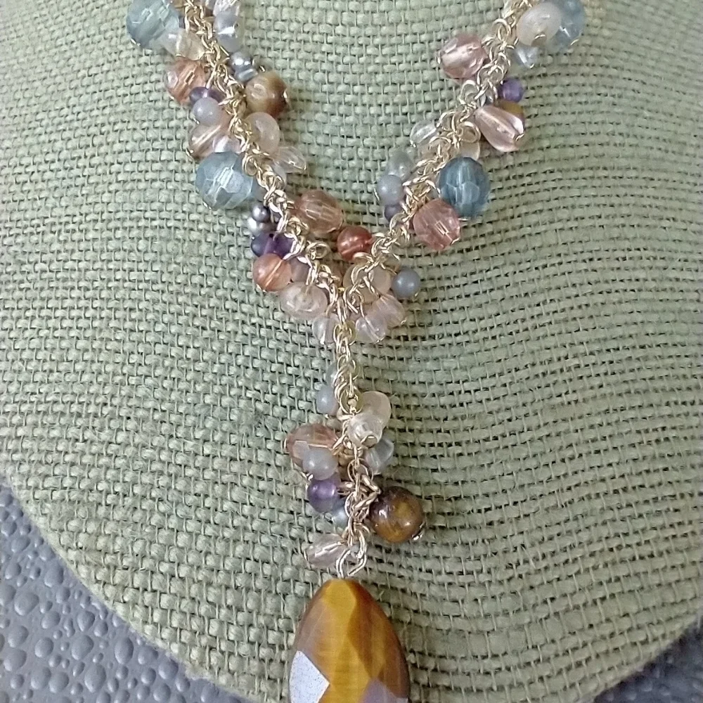 Avon women gold